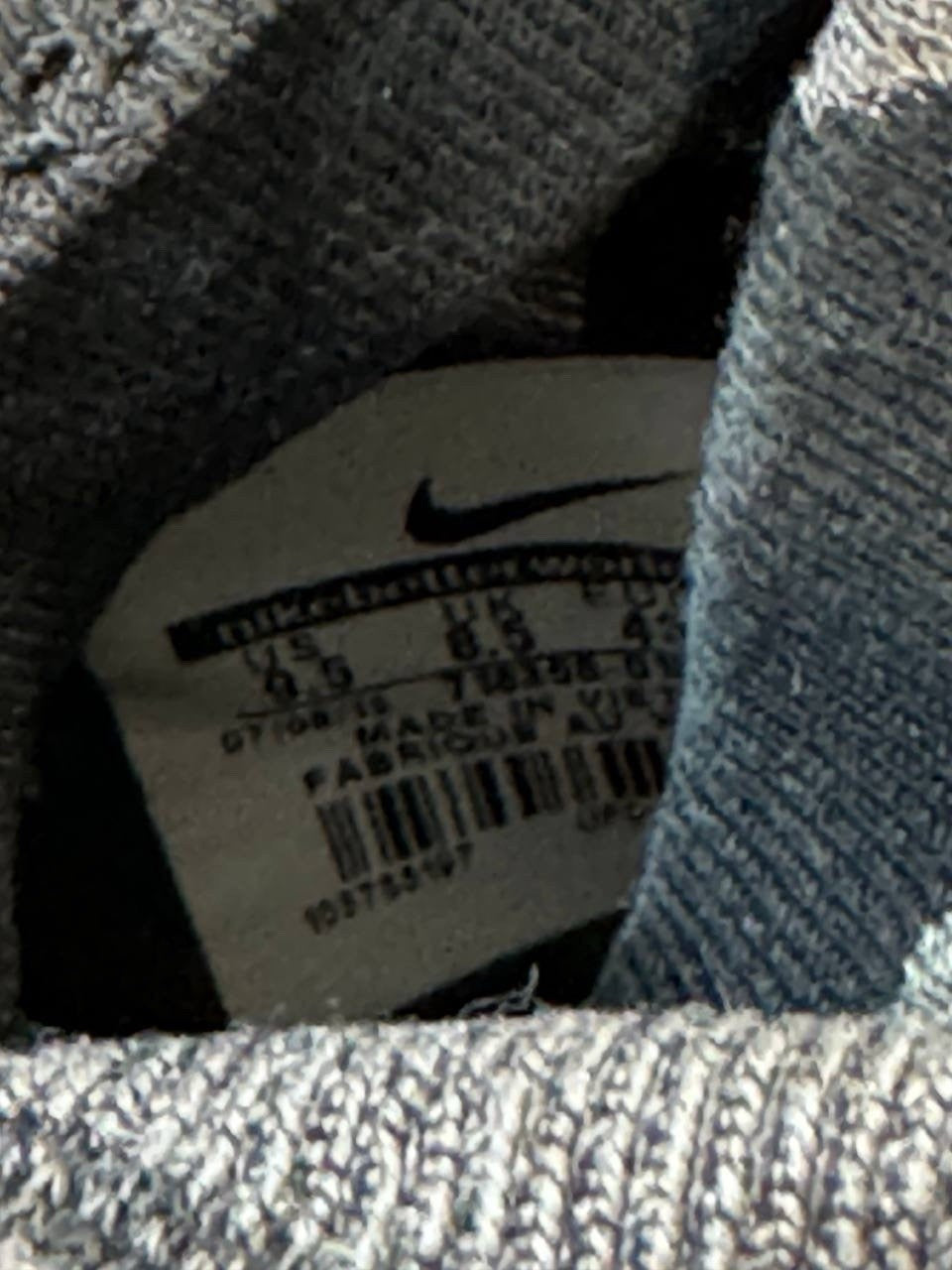 7699087