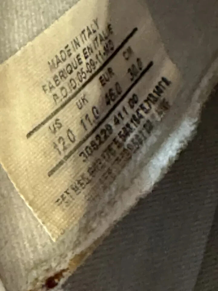 6973630