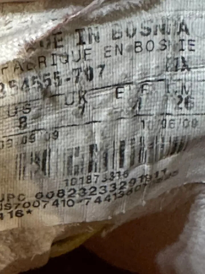 6973915