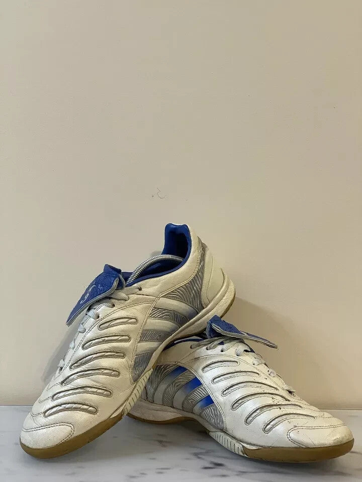 6973756