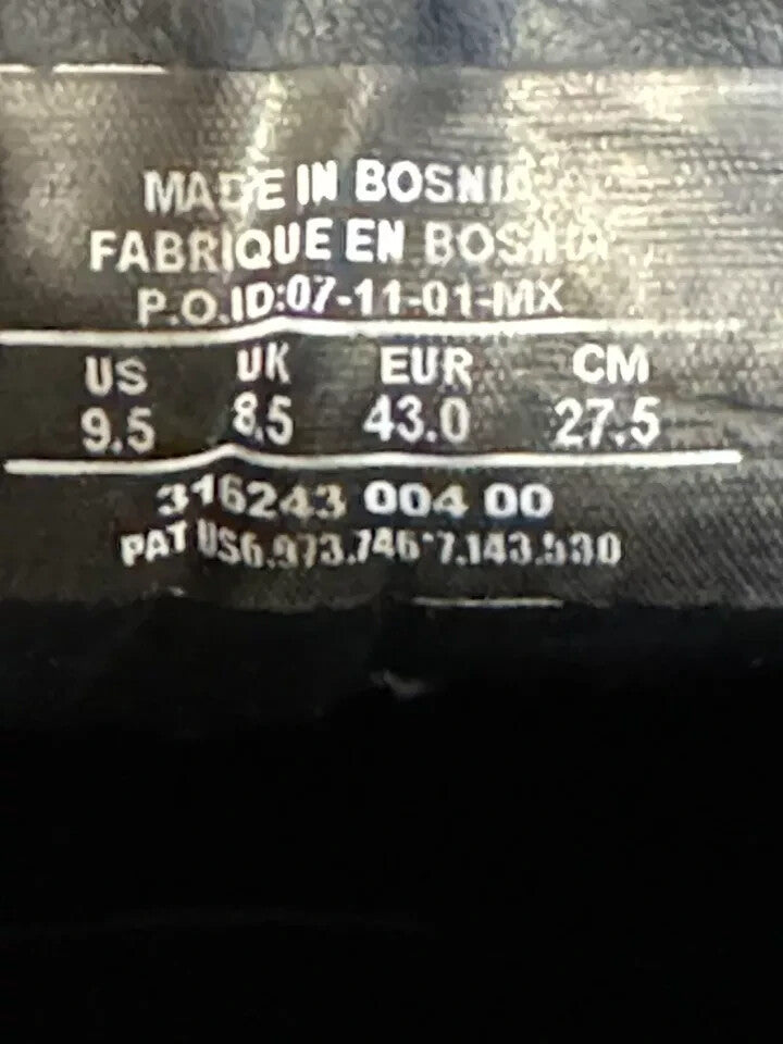 6973871