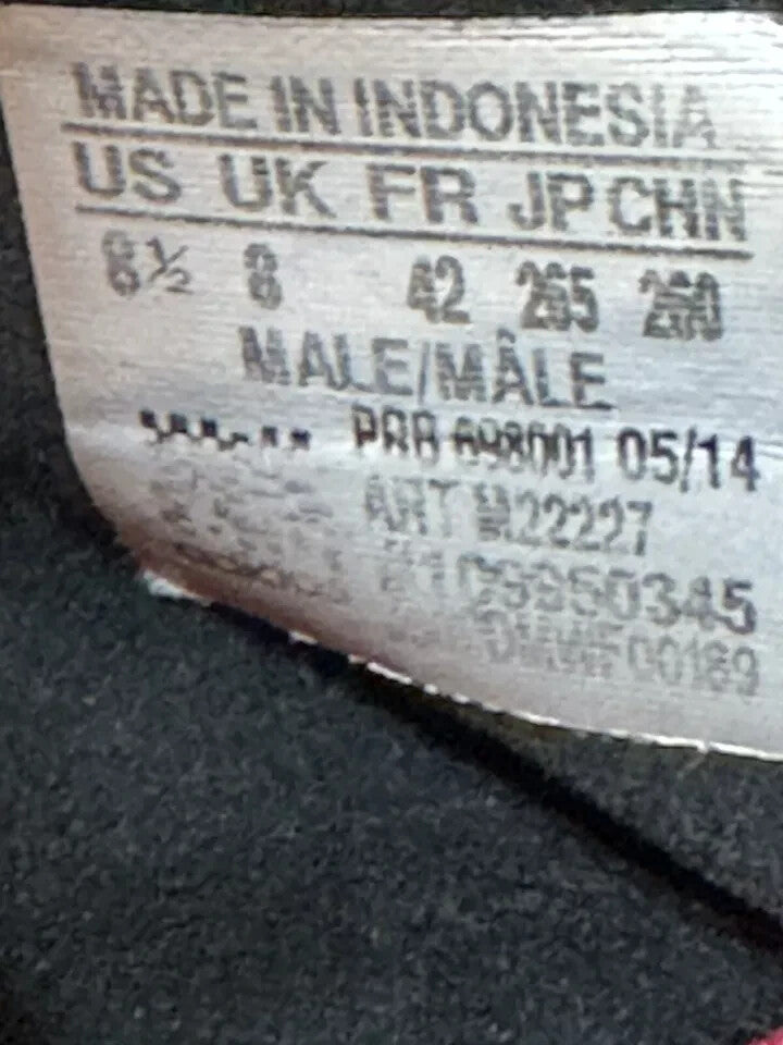 6973749