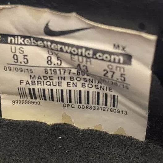 6973775