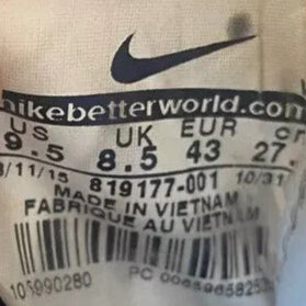 6973777