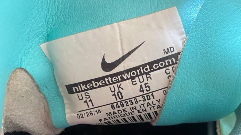 7698830