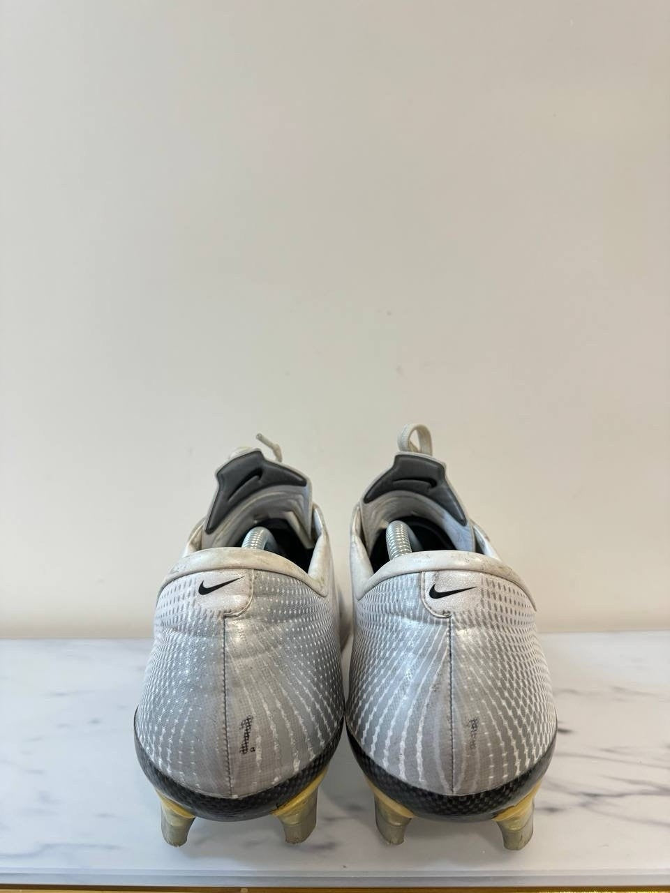7699084