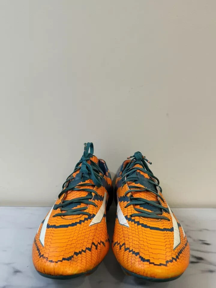 6973772