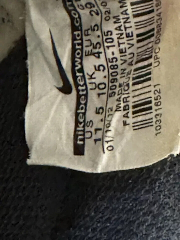 6973691