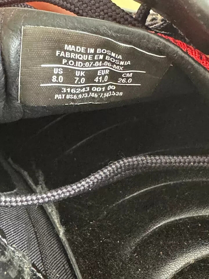 6973898