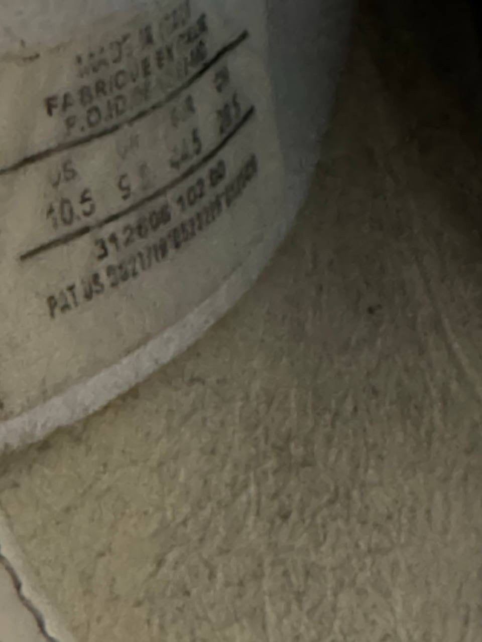 7699084