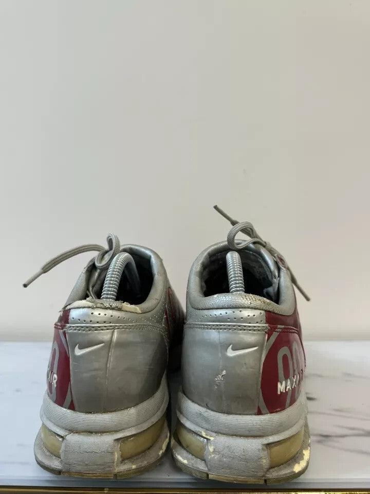 6973816