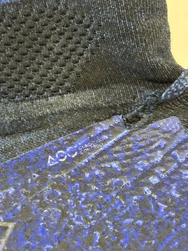 6973631