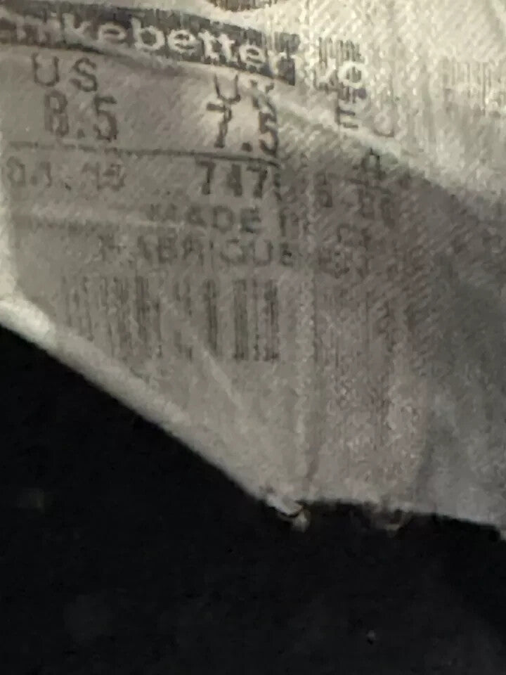 6973834