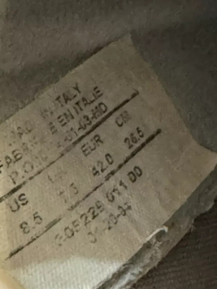 6973658