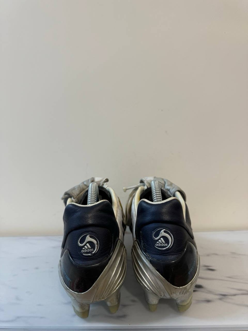 6973597