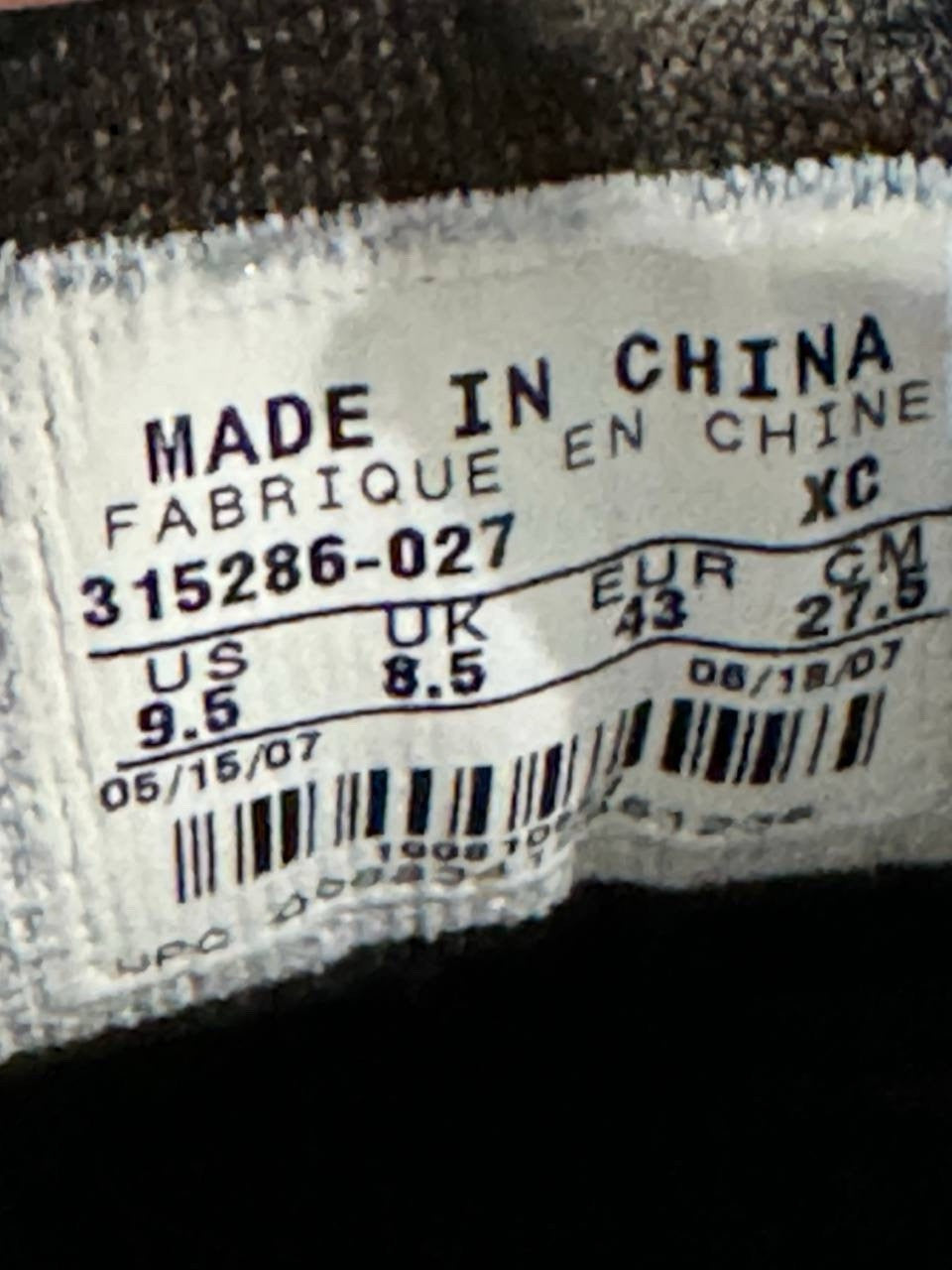 6973610