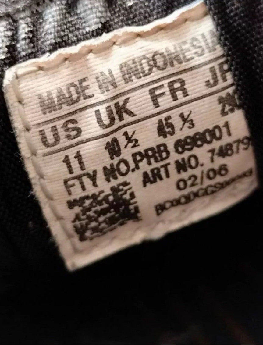 6973754