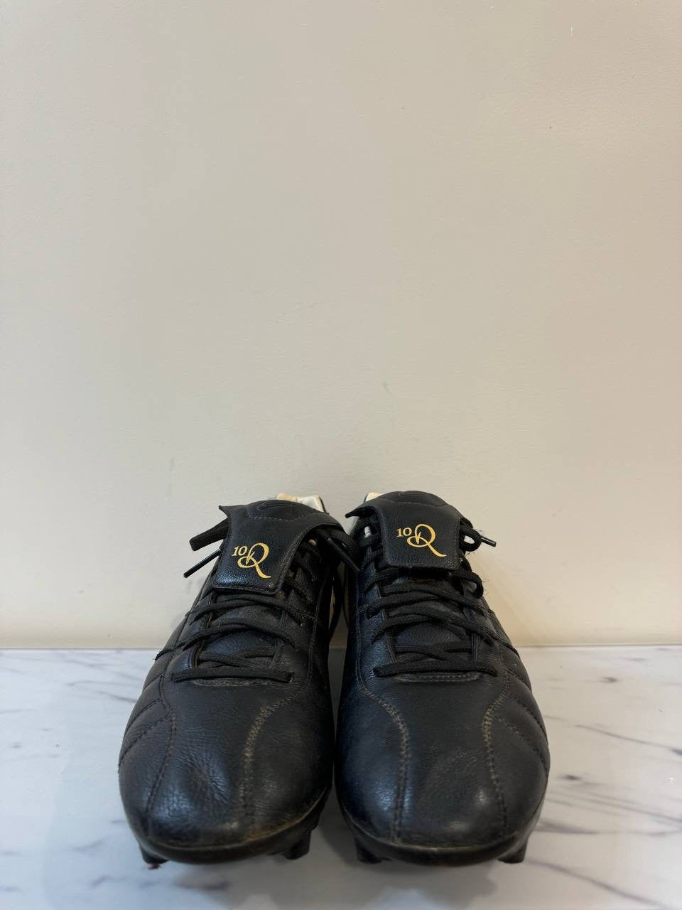 6973610
