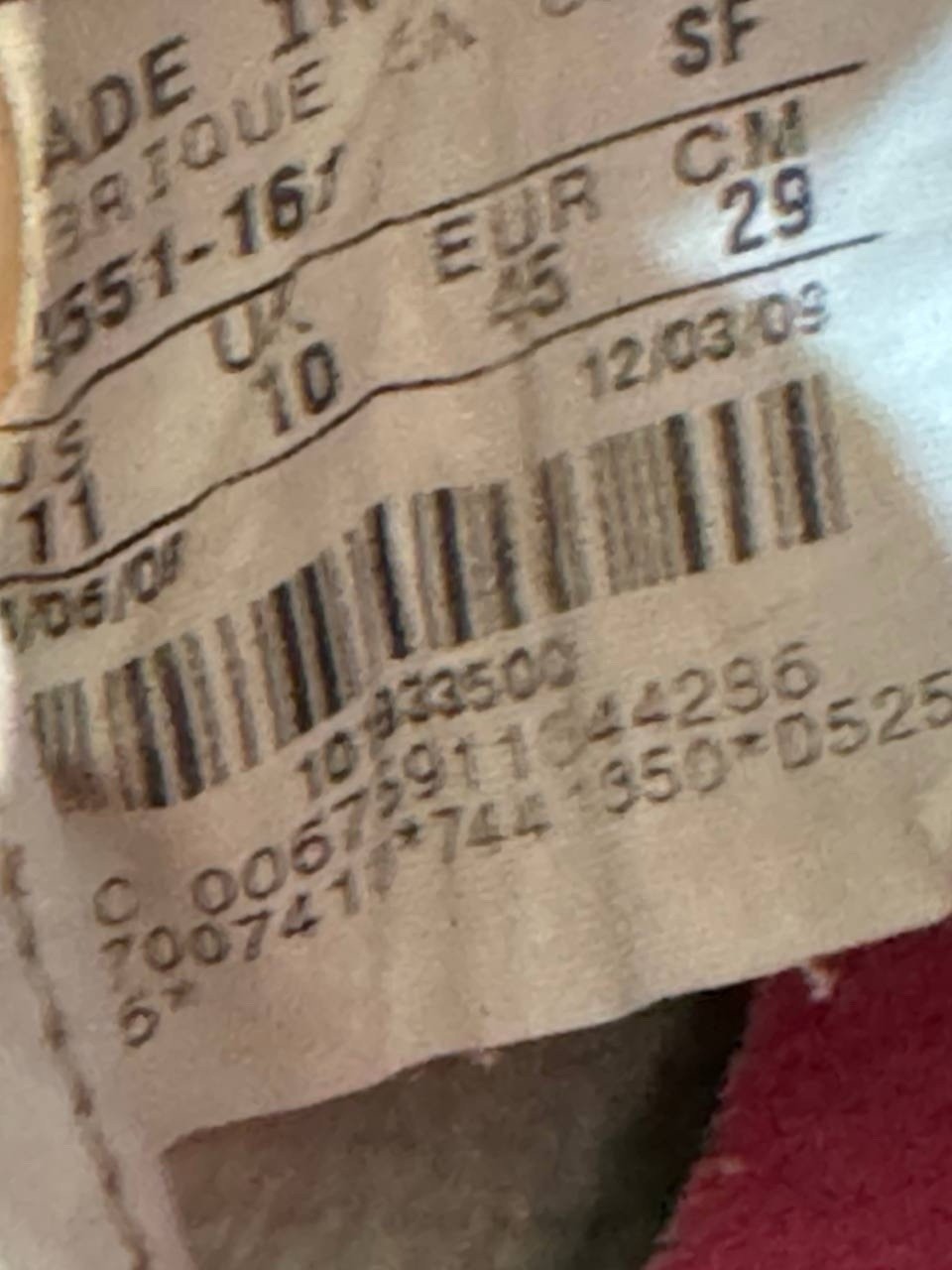 6973955